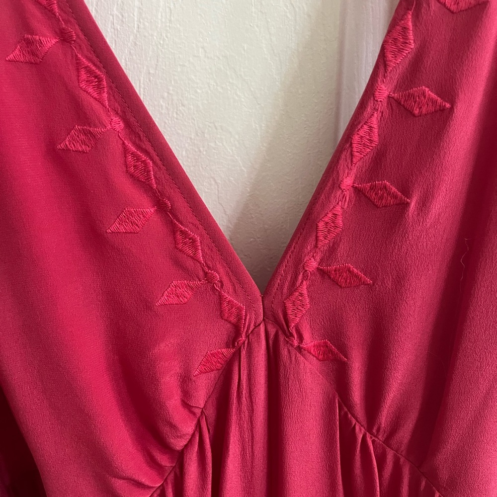 Pink silk wide leg jumpsuit from Anthropologie